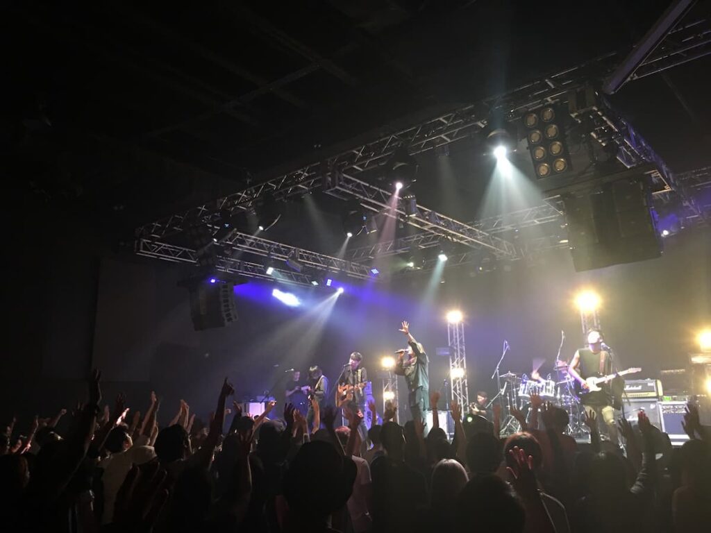 a band on stage with a crowd of people,The Calling,music
